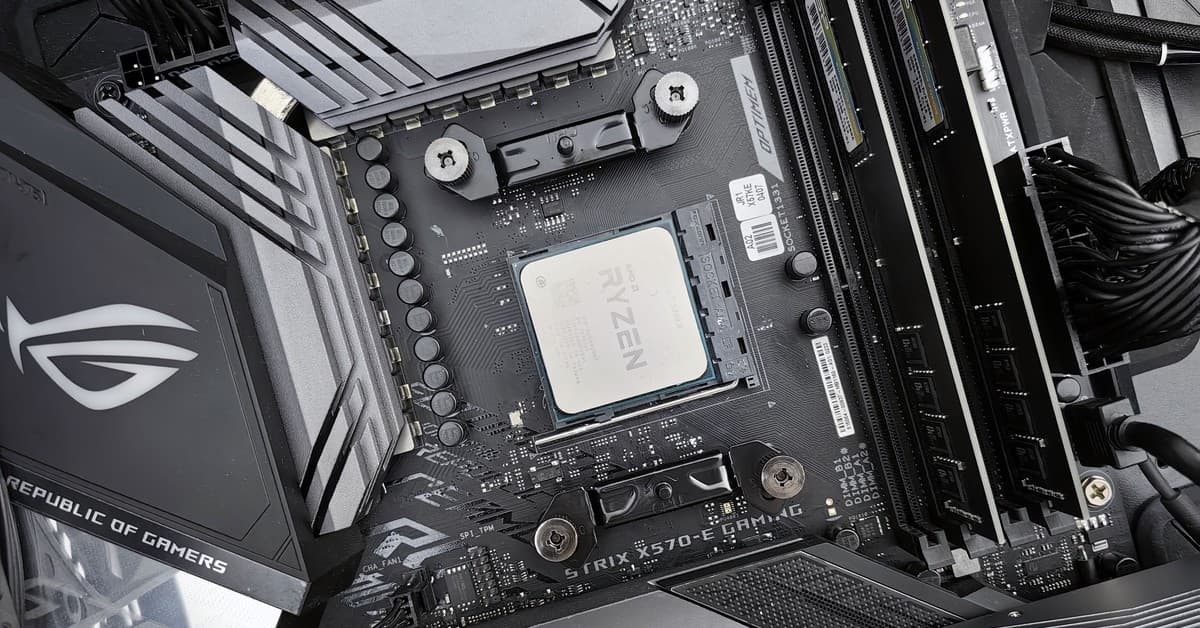Detailed view of a gaming motherboard, showcasing an AMD processor and components.
