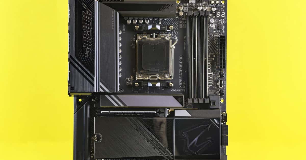 A powerful GIGABYTE motherboard displayed on a vibrant yellow background, showcasing technology.