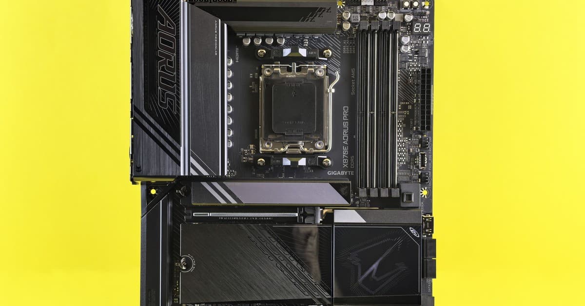 A powerful GIGABYTE motherboard displayed on a vibrant yellow background, showcasing technology.