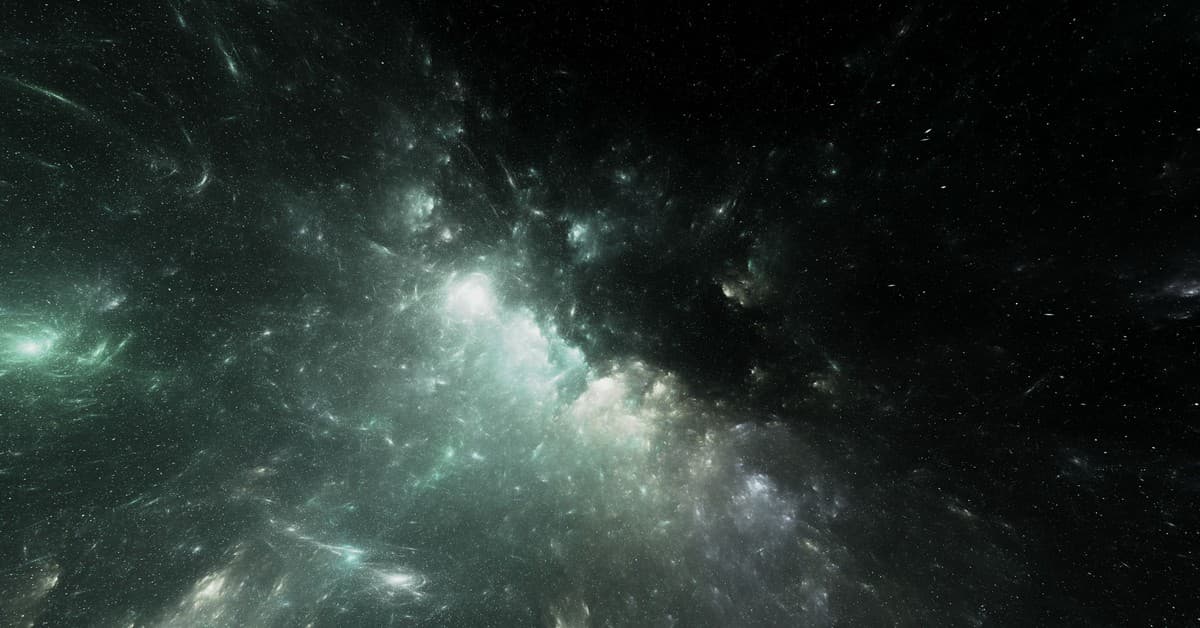 Ethereal image of a colorful nebula set against the vast starry cosmos.