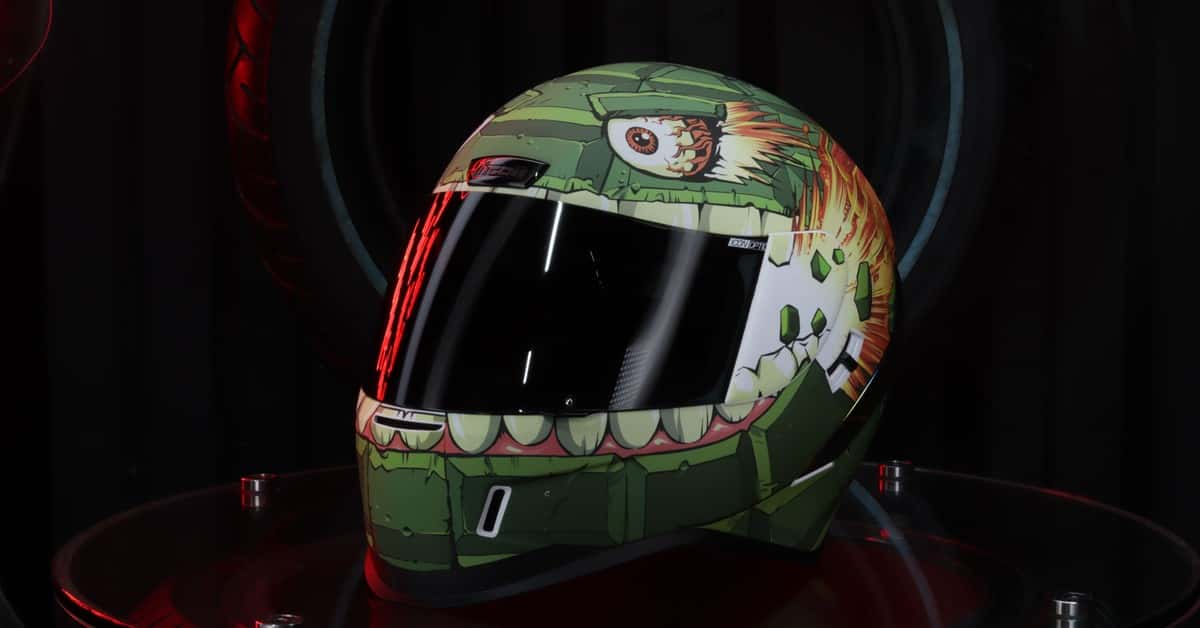 Vibrant motorcycle helmet with eye-catching art design, perfect for protection and style.