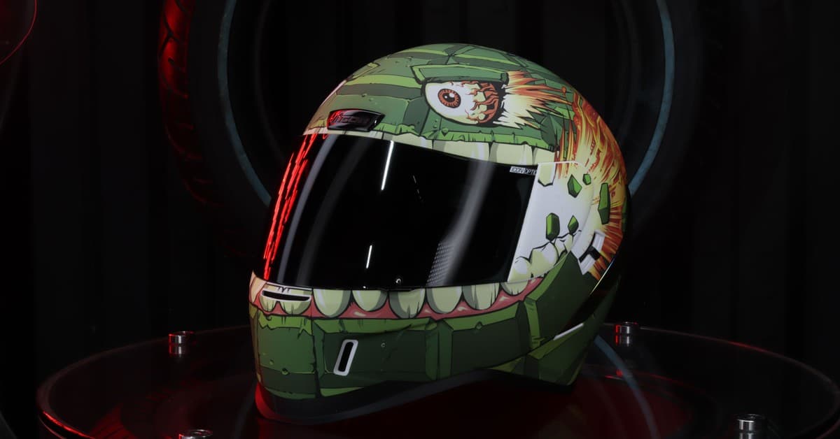 Vibrant motorcycle helmet with eye-catching art design, perfect for protection and style.