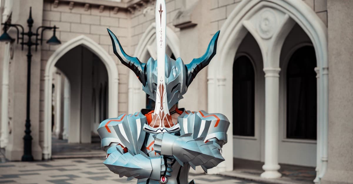 A person in detailed fantasy armor holding a sword in front of an architectural backdrop, creating a dramatic atmosphere.