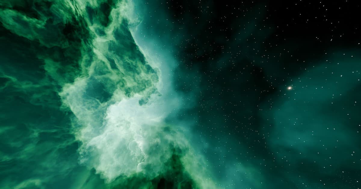Beautiful green nebula in deep space with stars shining brightly.