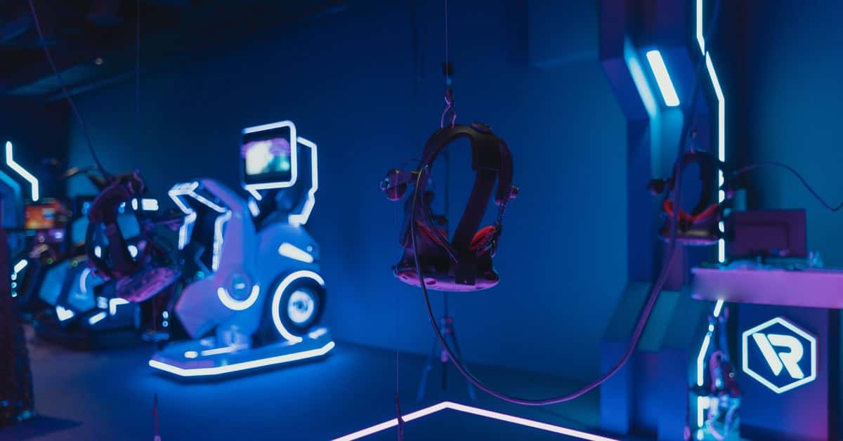Immersive VR gaming setup with neon lights showcasing advanced technology.
