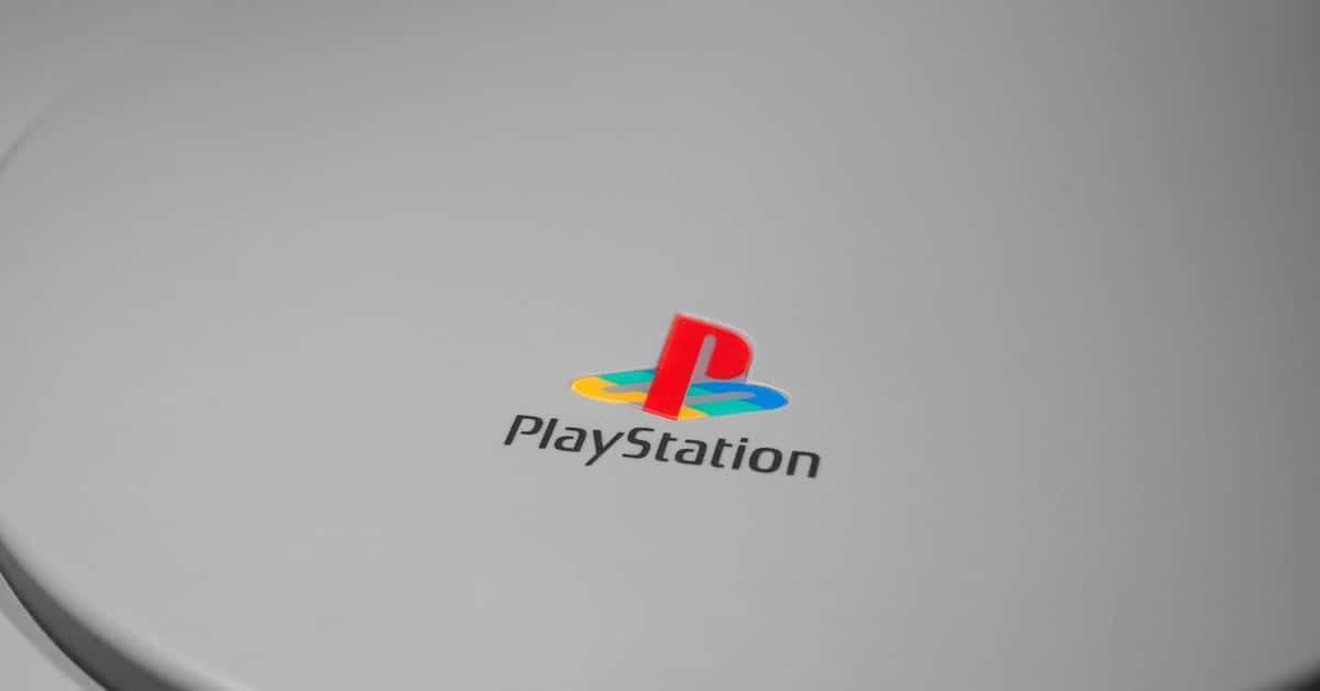 Detailed close-up of iconic PlayStation console logo, perfect for gaming-related content.