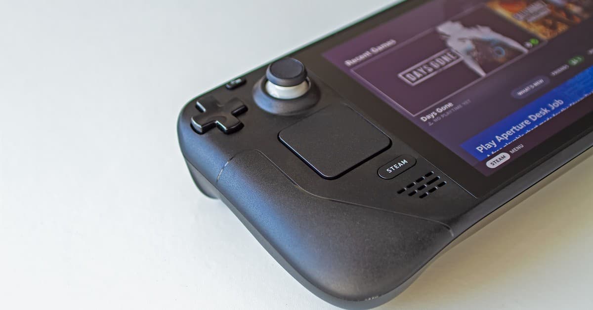 Detailed view of a handheld gaming console showcasing game selection on its screen.