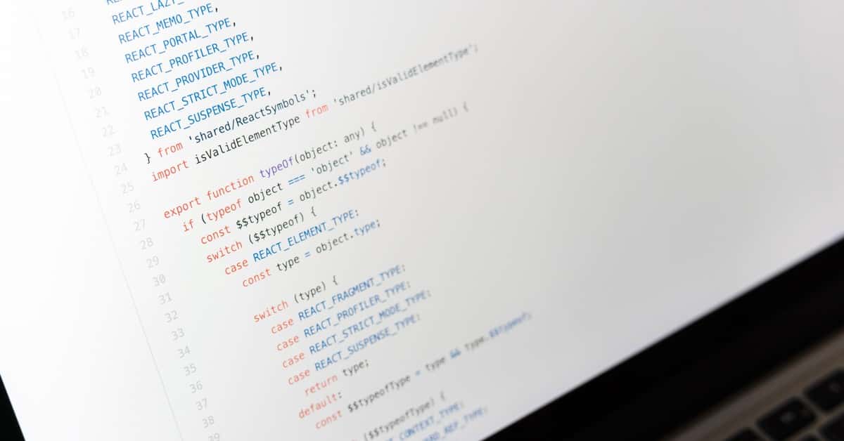 Close-up of JavaScript code on a laptop screen, showcasing programming in progress.