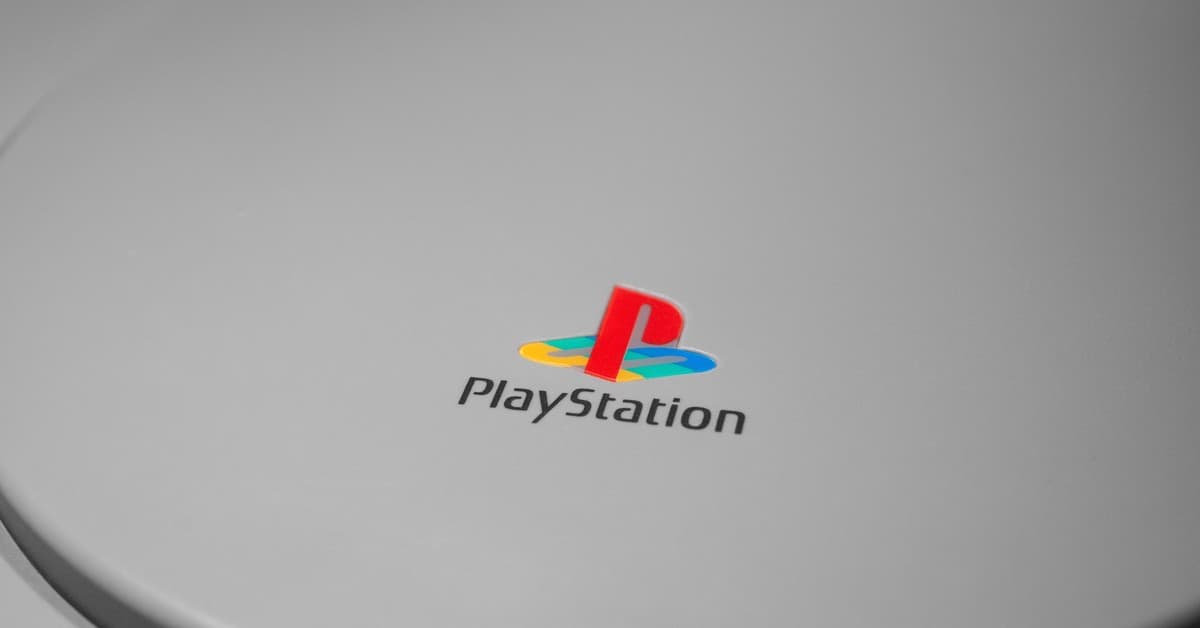 Detailed close-up of iconic PlayStation console logo, perfect for gaming-related content.