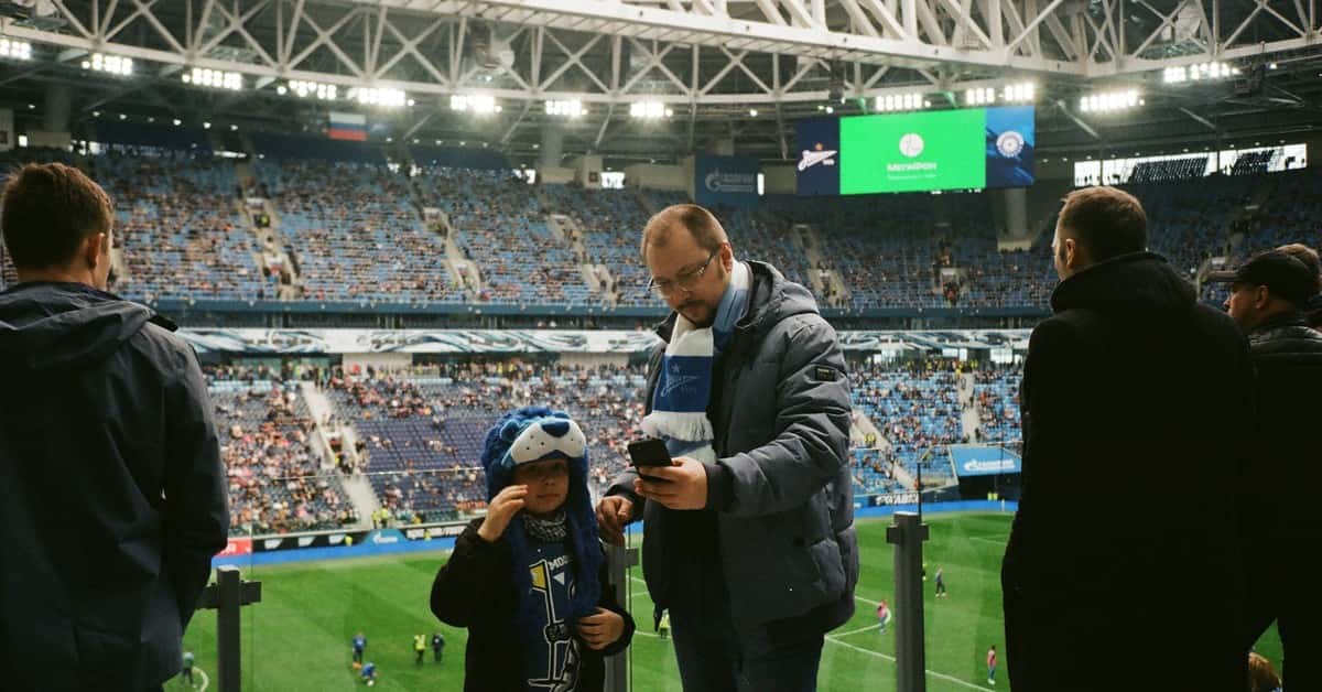 Crowd enjoying a football match in Saint Petersburg stadium, Russia.