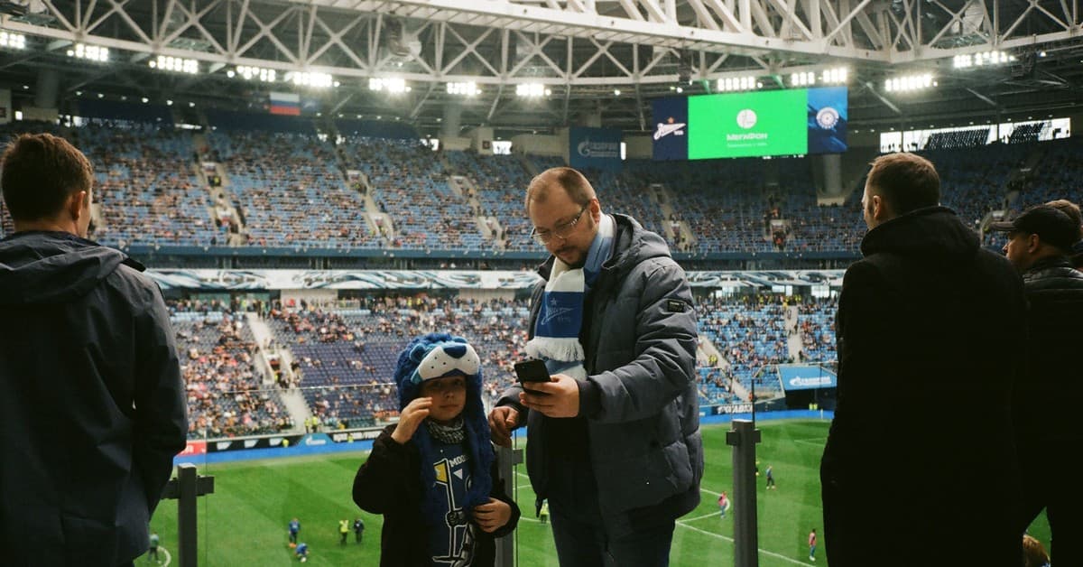 Crowd enjoying a football match in Saint Petersburg stadium, Russia.