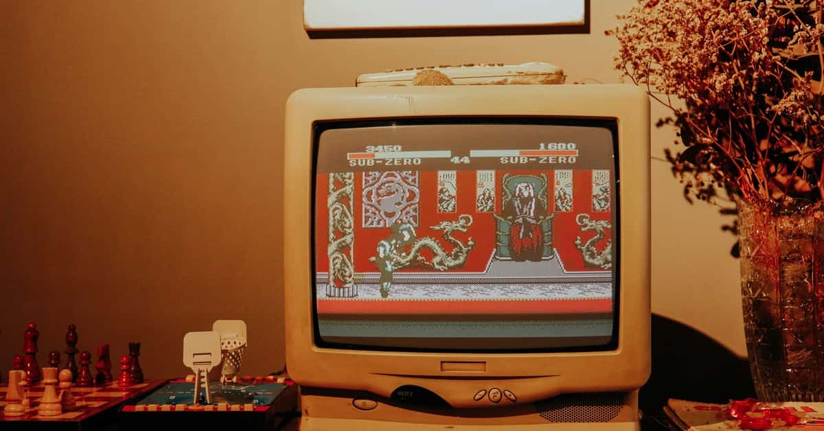 Retro living room scene featuring vintage TV playing classic video game.