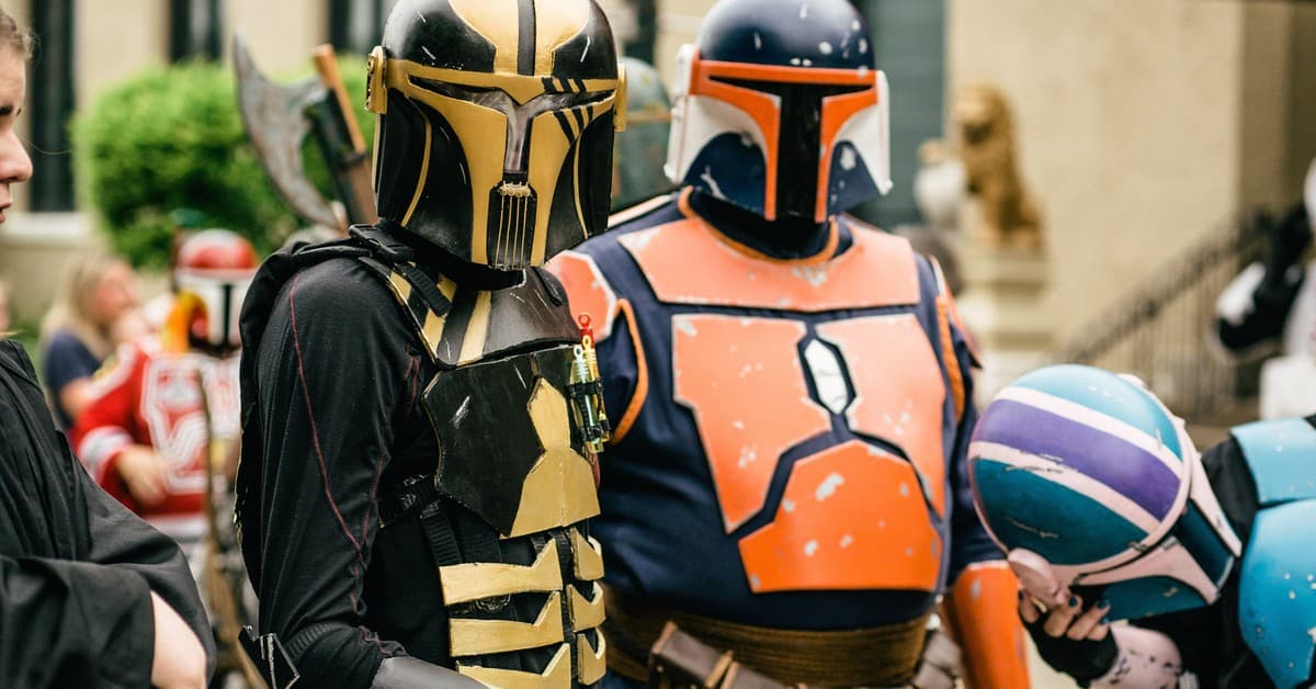 Colorful Star Wars cosplay event in Joliet, featuring detailed Mandalorian costumes and helmets.