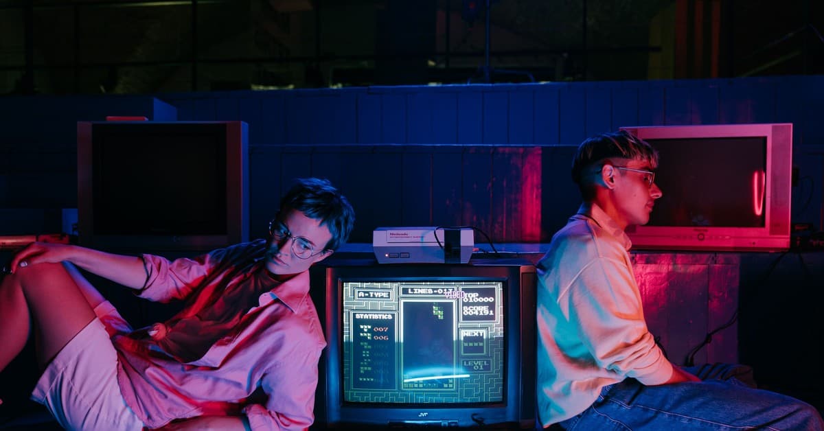 Teenagers enjoying retro gaming on vintage screens with neon lights. Nostalgic 80s vibe.