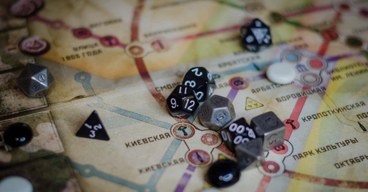A vibrant board game scene featuring dice and a colorful map layout.